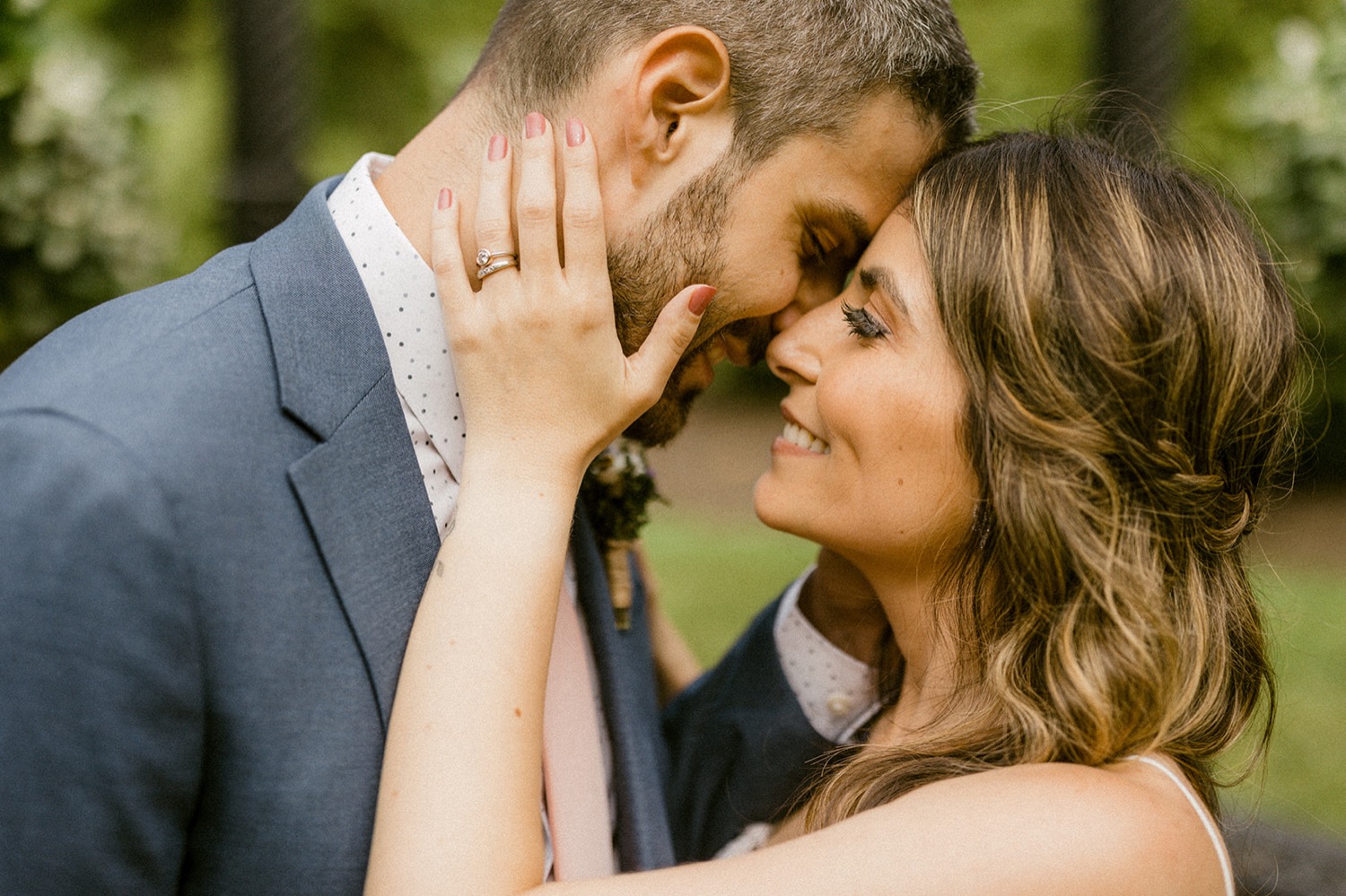 couple kissing intimate close up during wedding