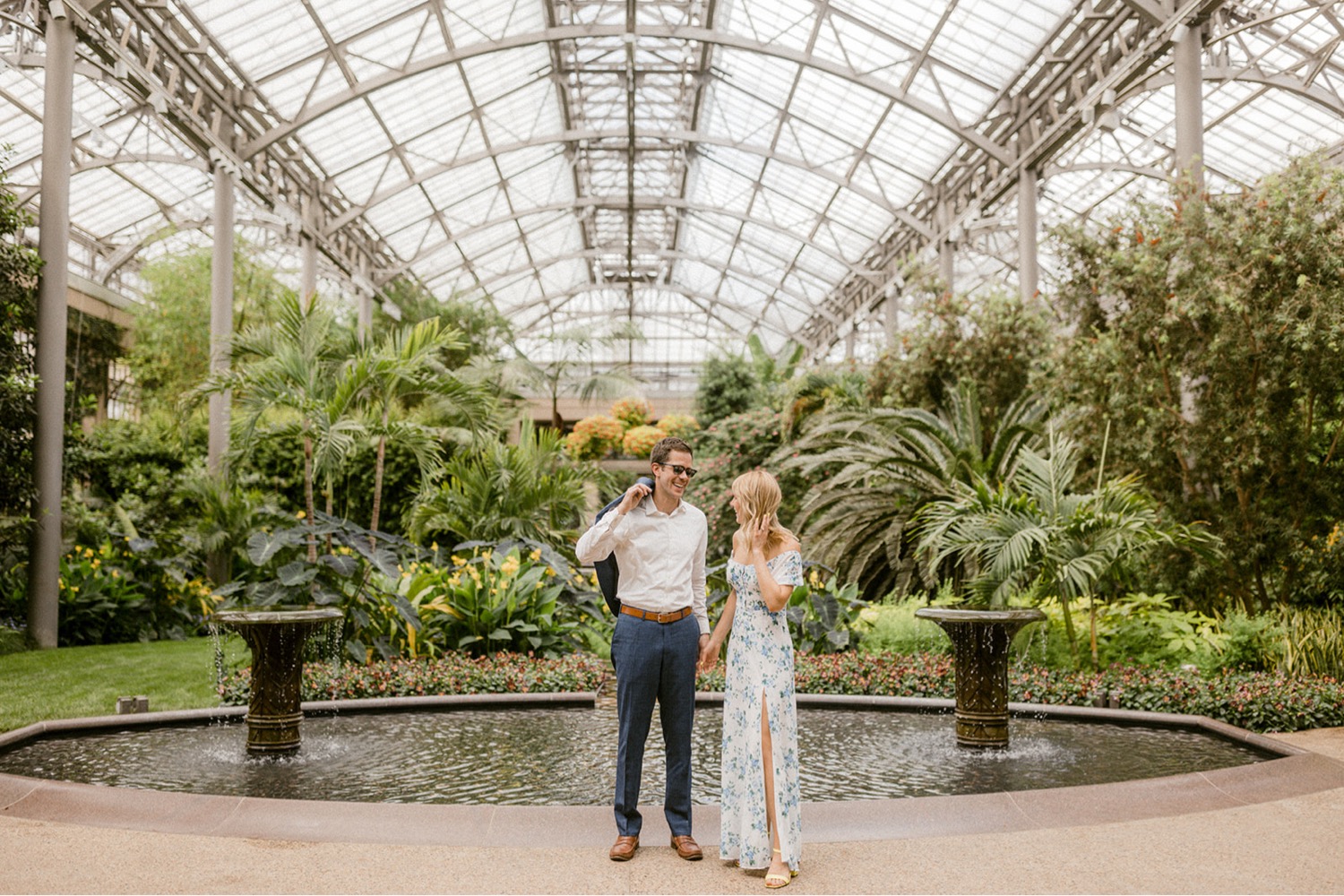 couple in greenhouse longwood gardens engagement session