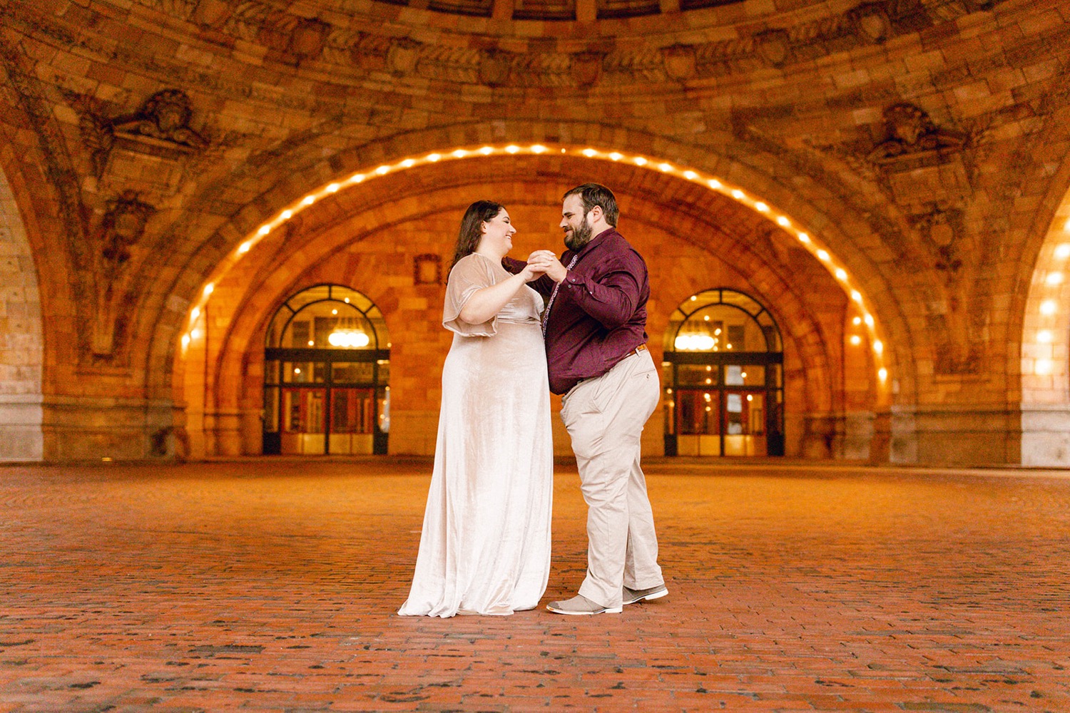 couple dancing under rotunda at the pennsylvanian