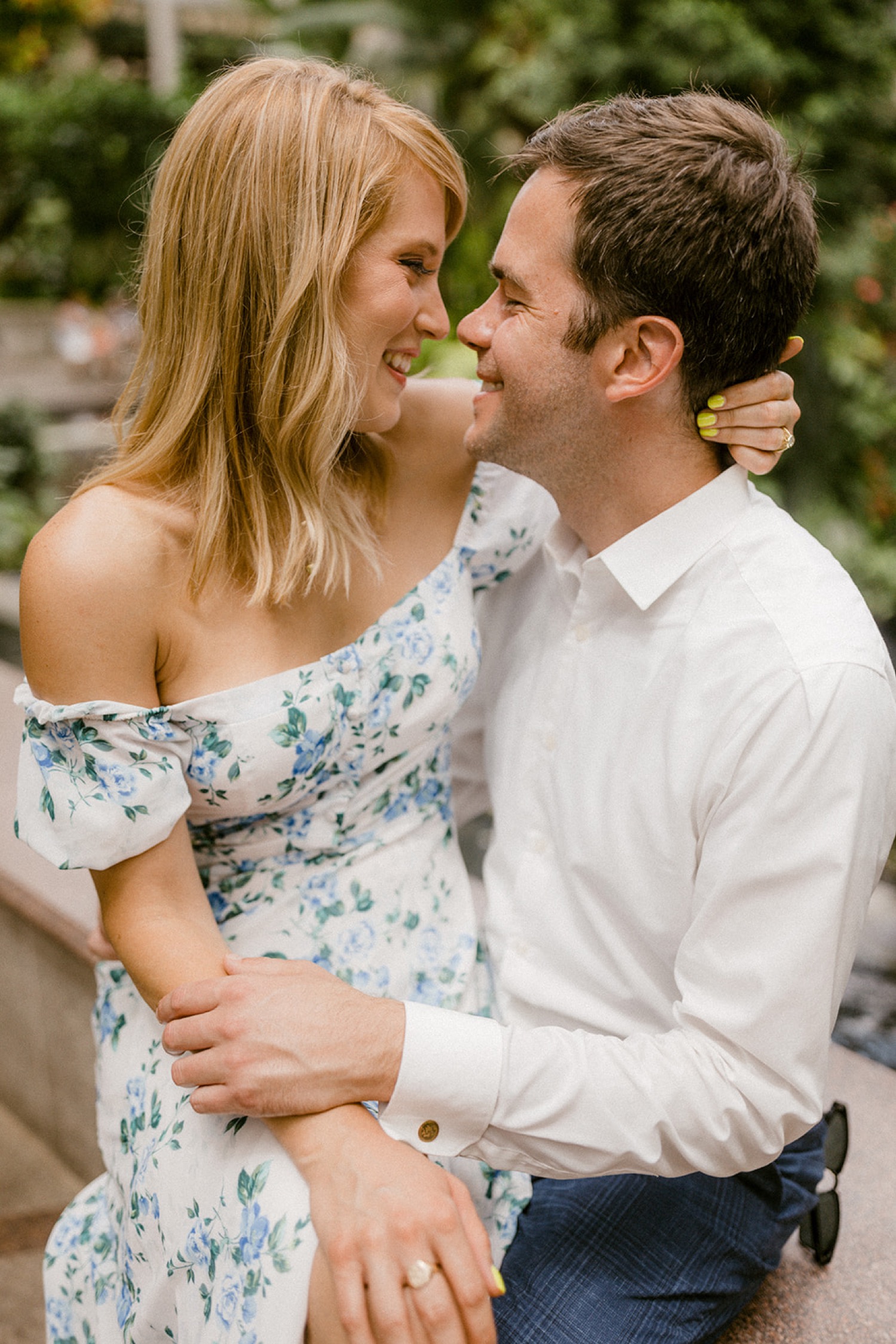 intimate moment during garden engagement session