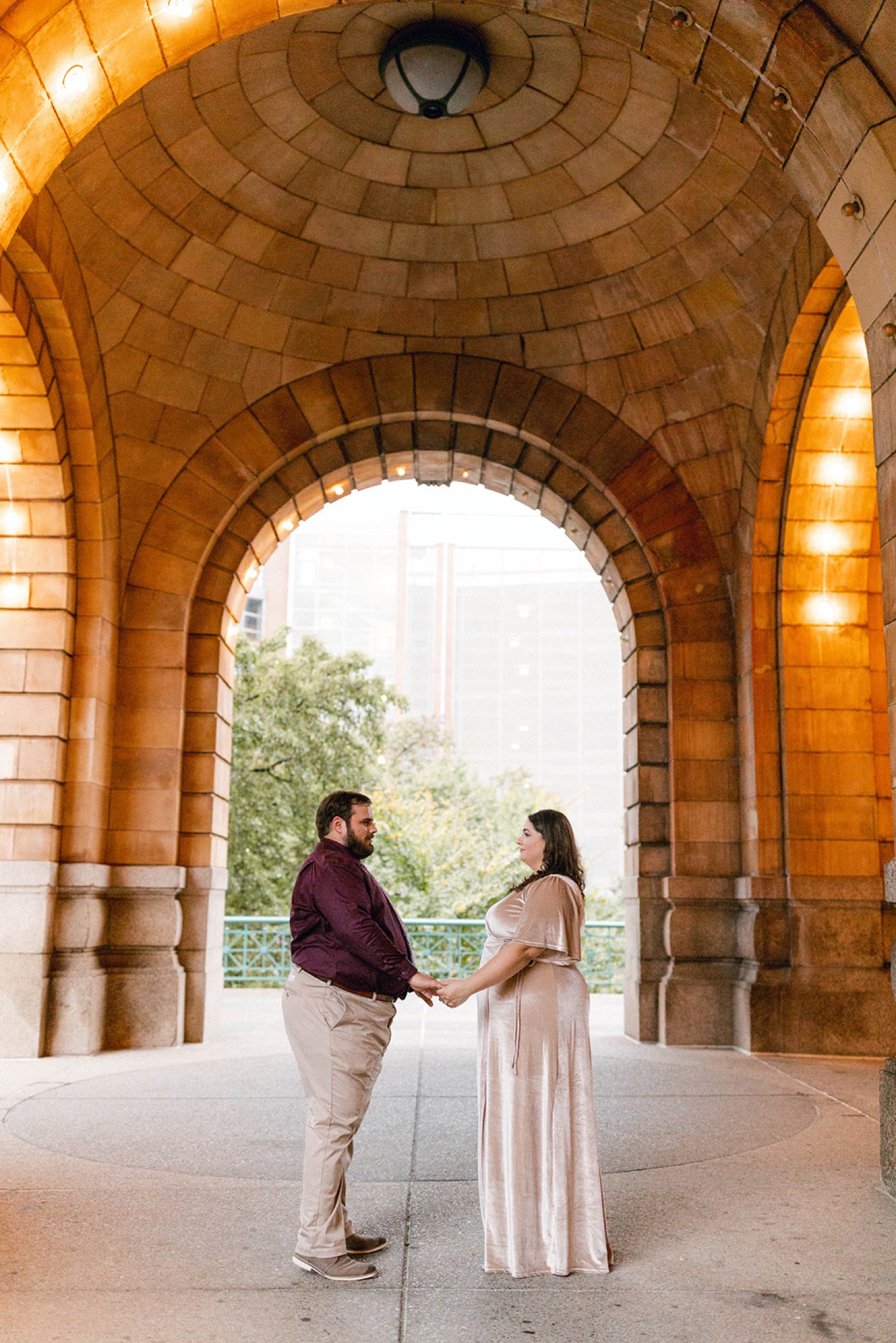 couple holding hands at the pennsylvanian pittsburgh engagement session