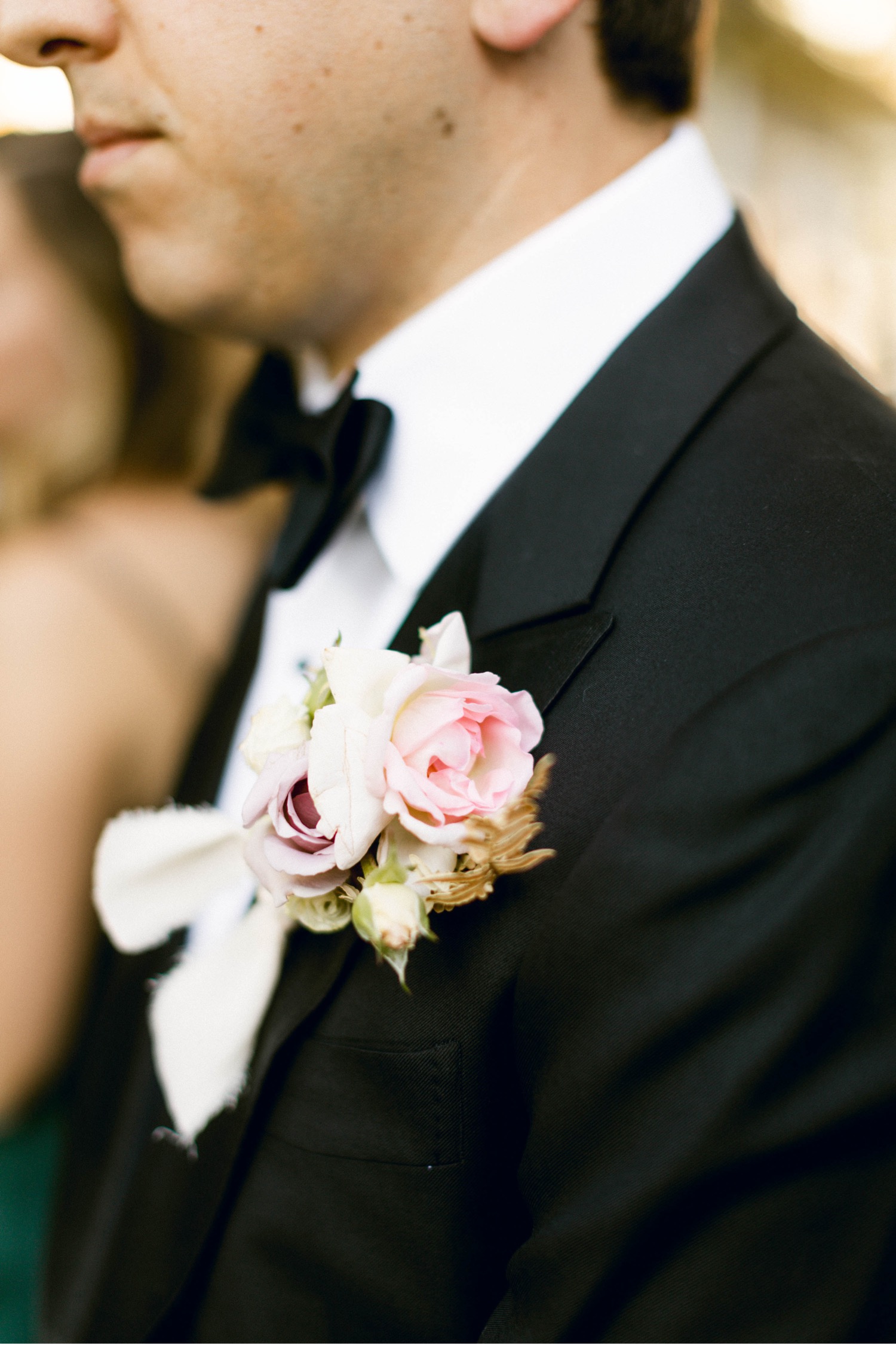 groom flowers boutonniere pink