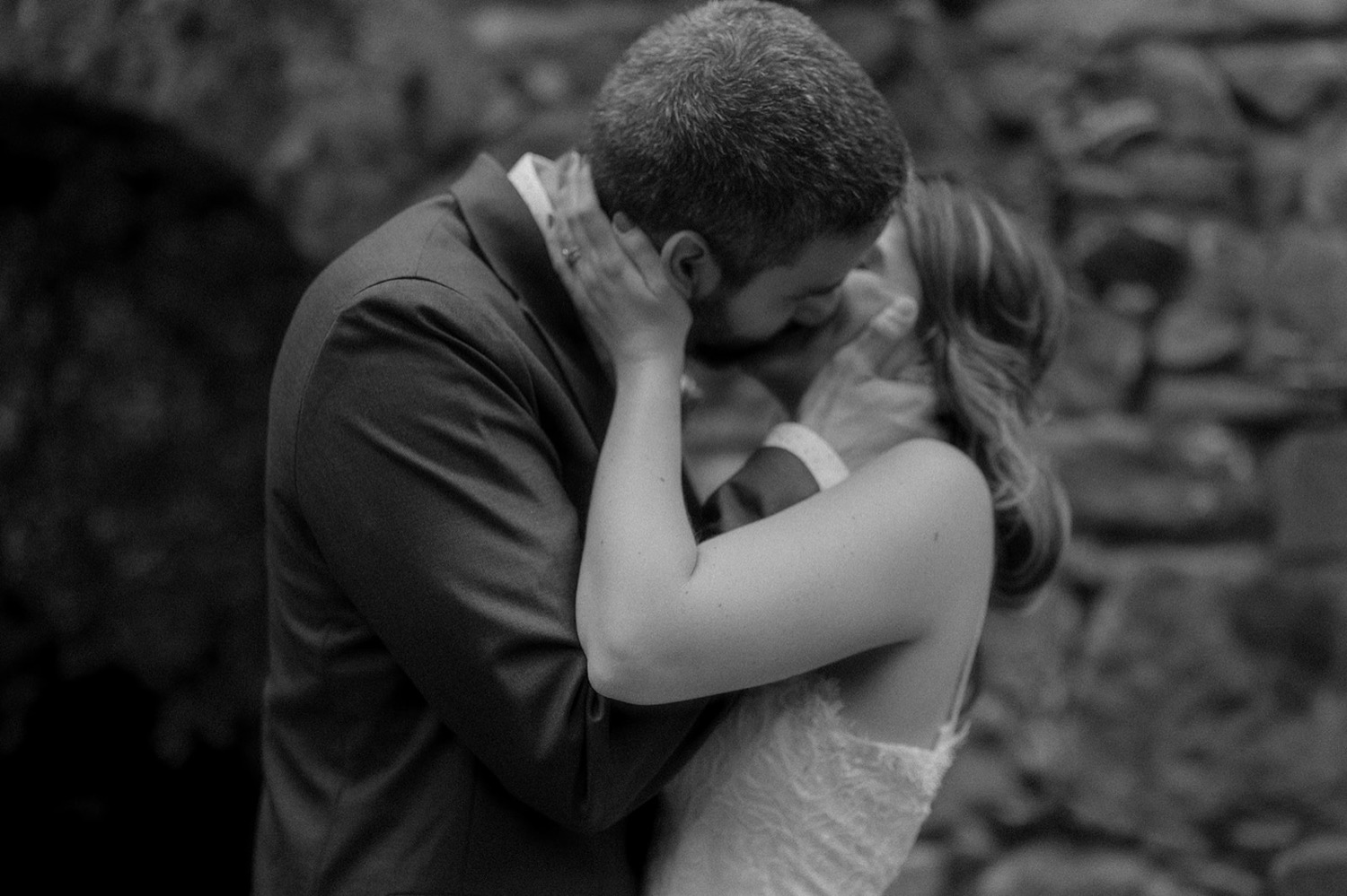 couple intimate kiss wedding session