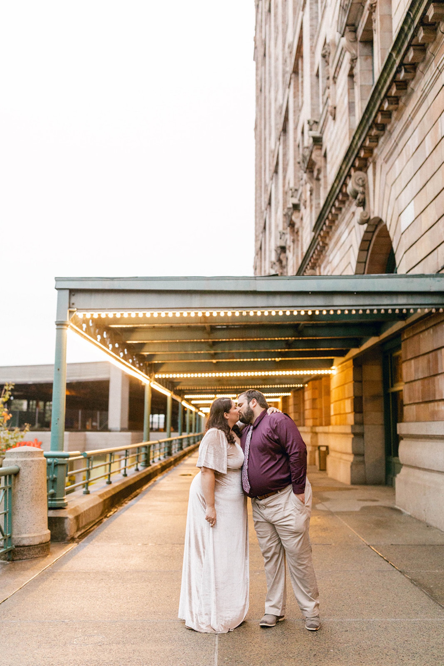 couple kissing formal urban engagement session