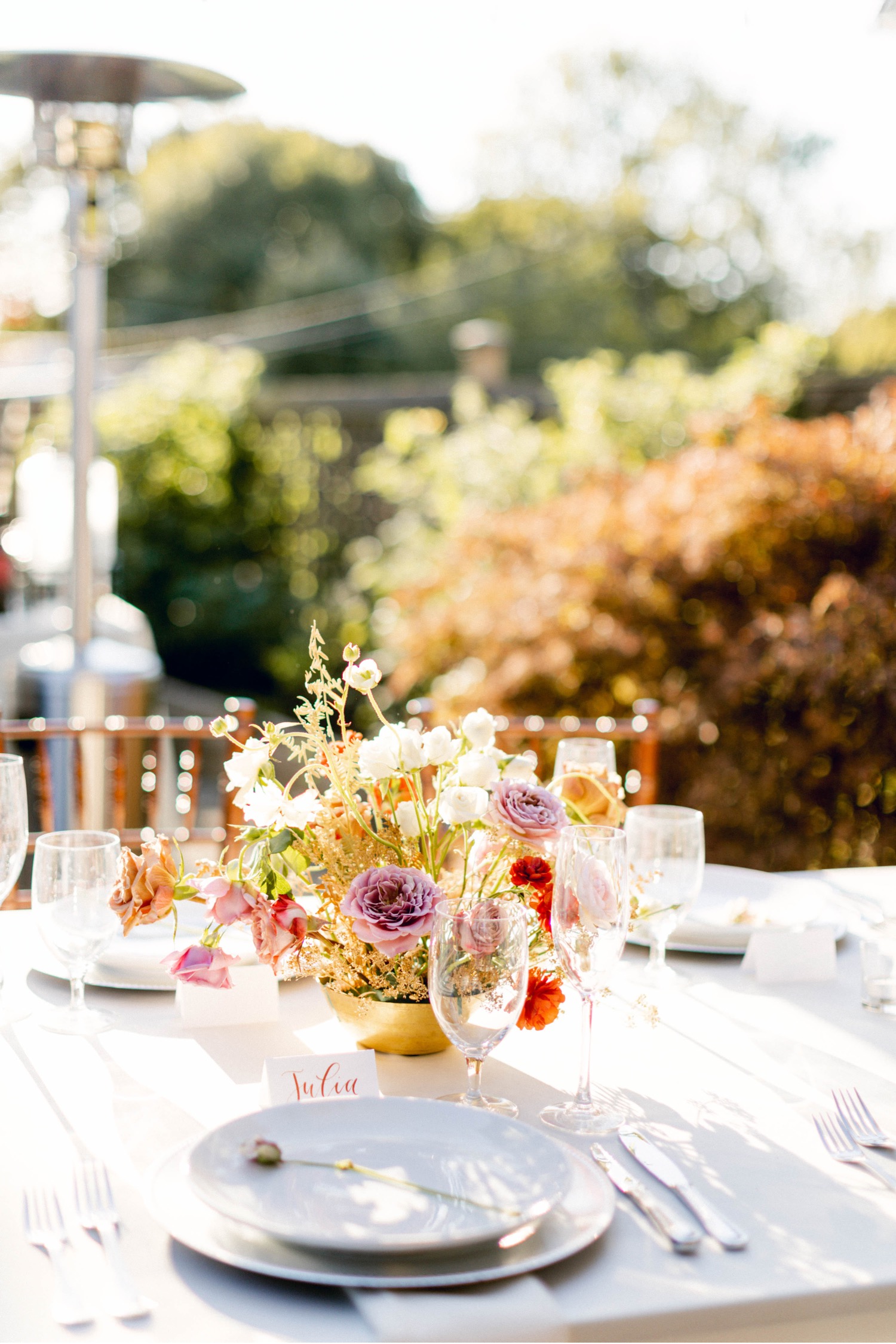 pink flowers centerpieces luxurious backyard wedding