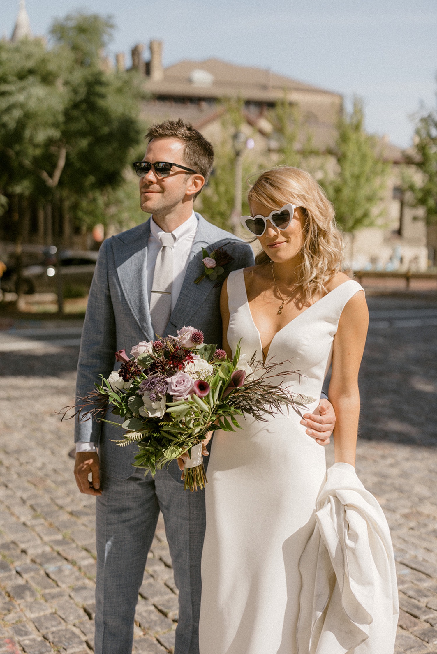 bride and groom wearing sunglasses couples portrait wedding