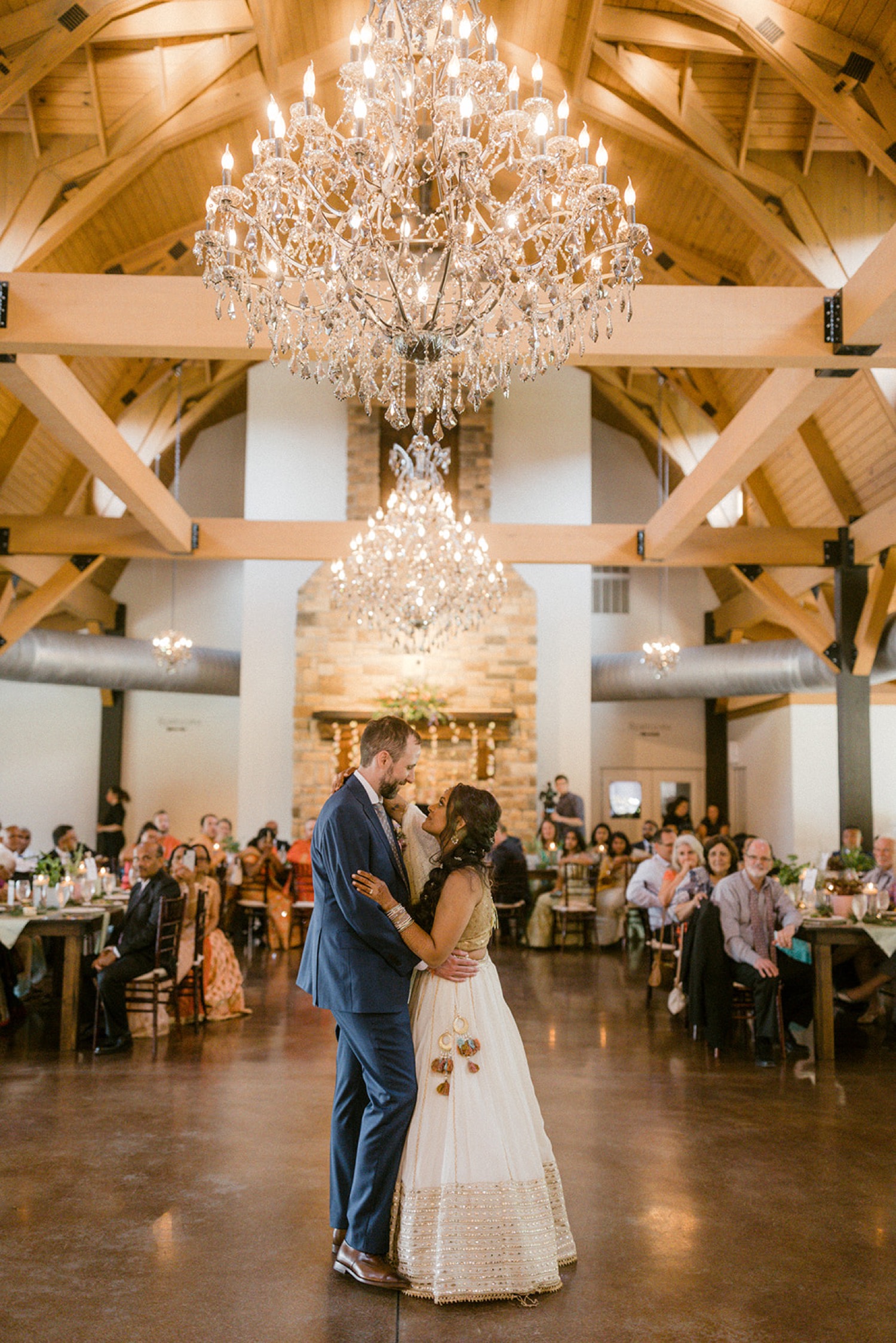 couple first dance under chandelier Historic Acres of Hershey Wedding