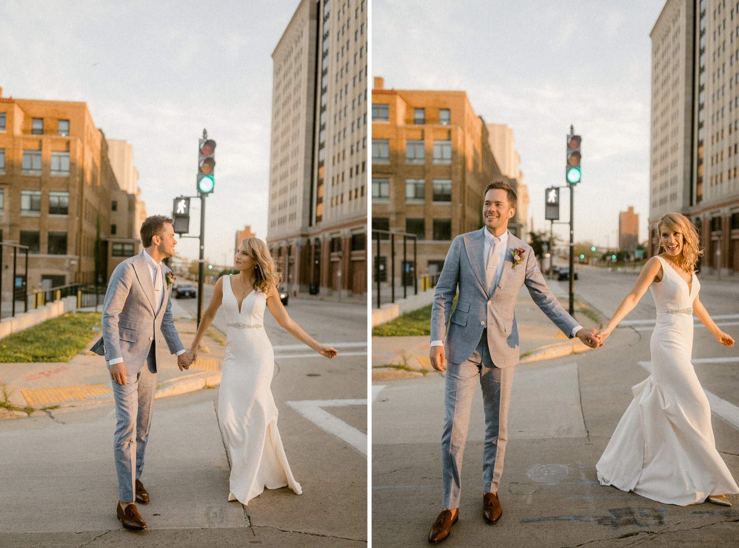 couple holding hands in crosswalk downtown Milwaukee wedding