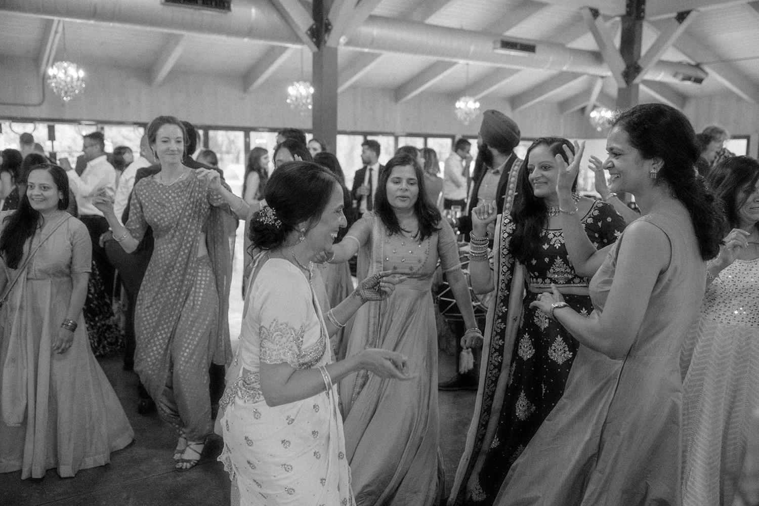 wedding guests dancing laughing wedding reception