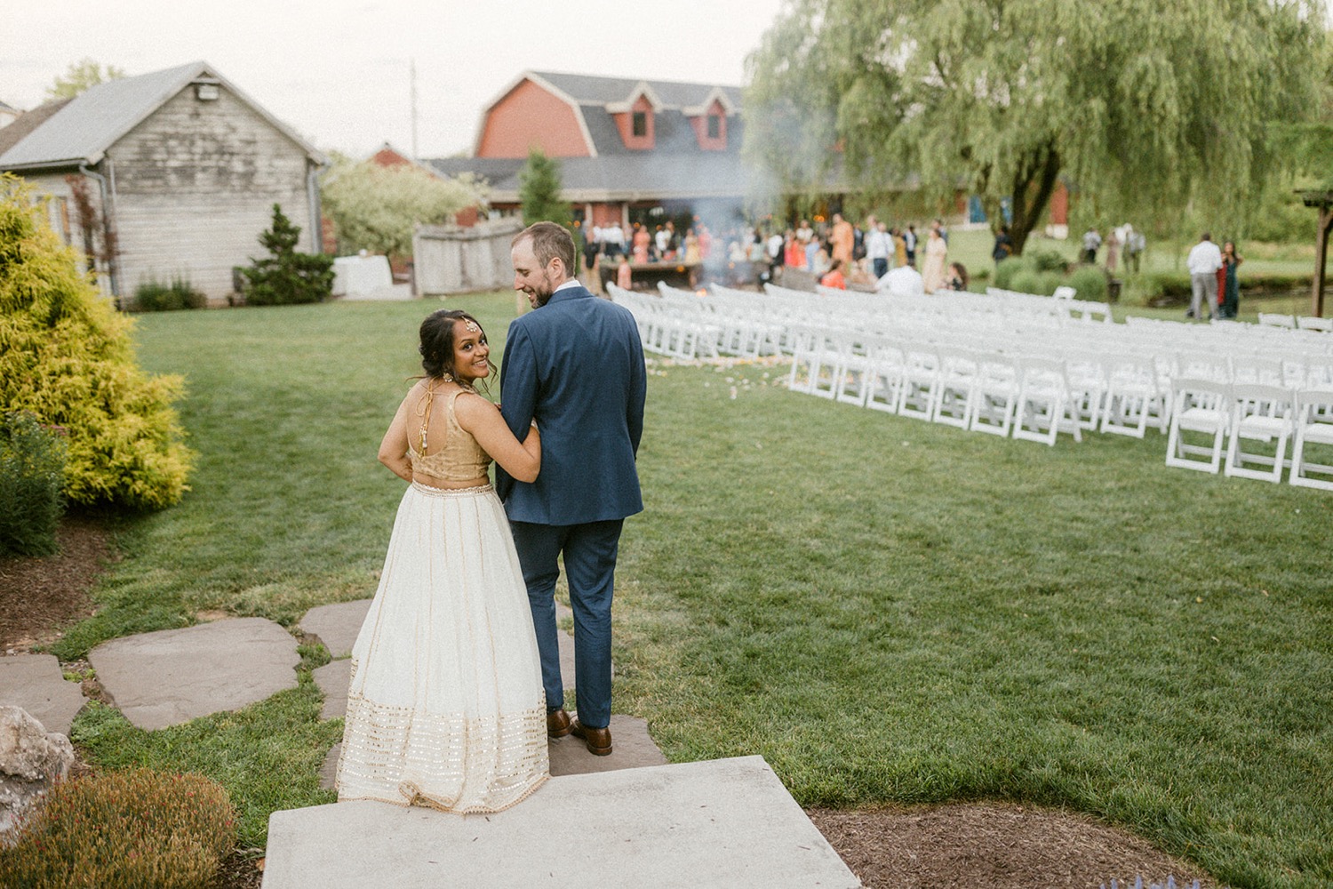 bride and groom looking over shoulder Historic Acres of Hershey Wedding