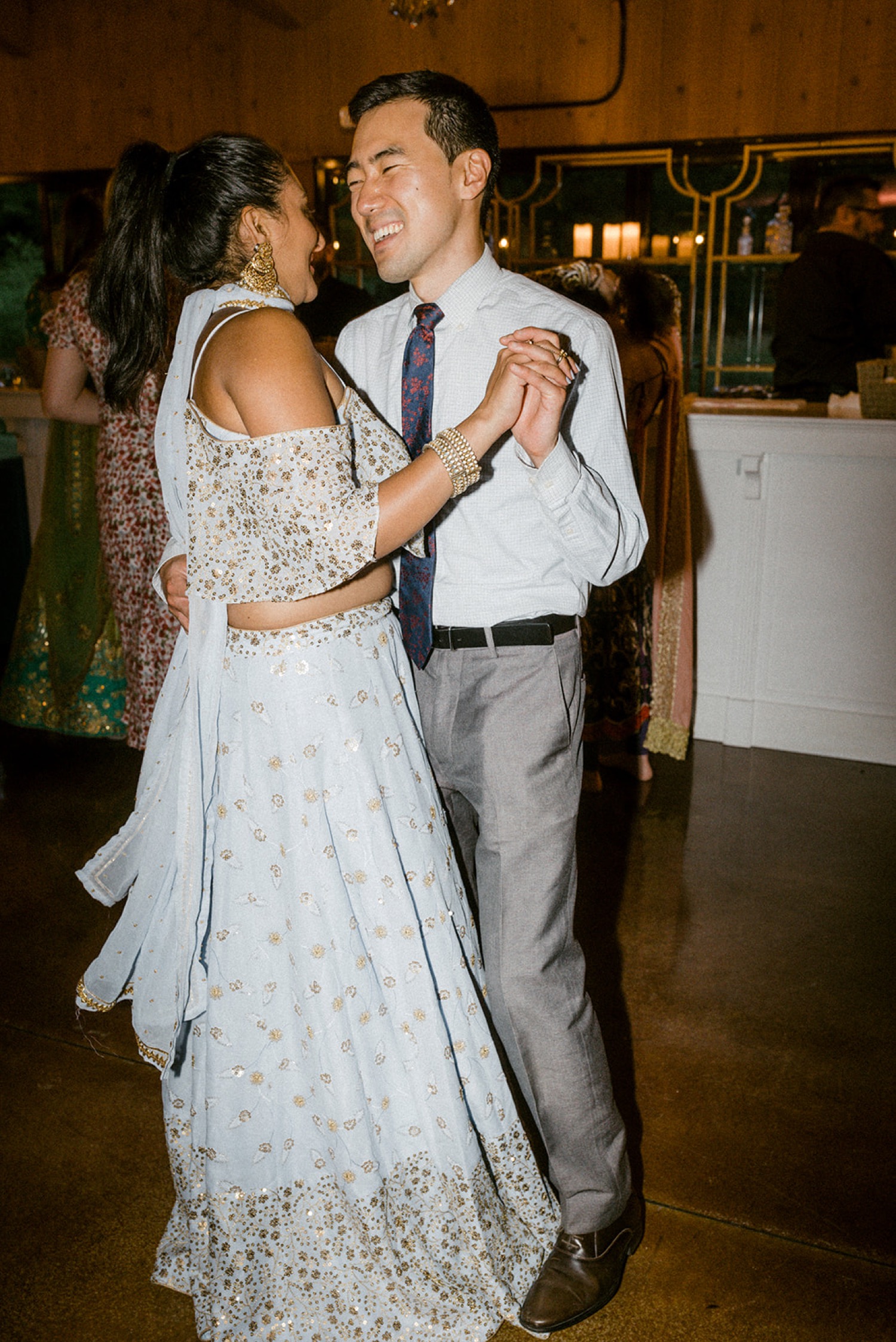 couple slow dancing at wedding reception