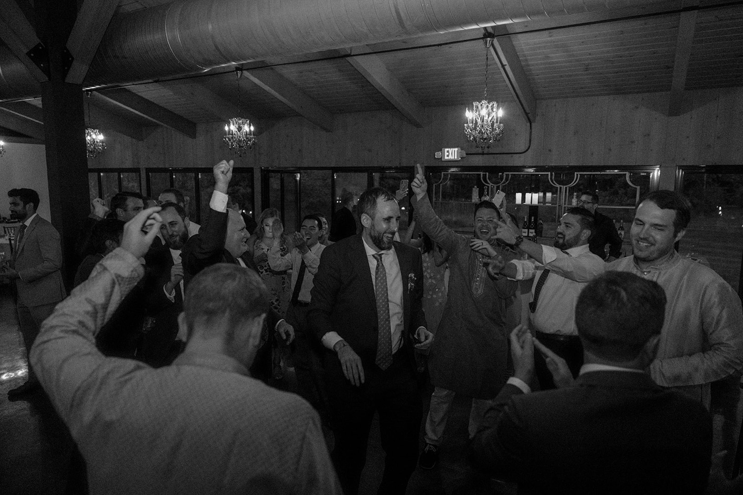 groom dancing wedding reception